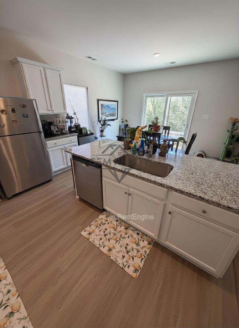Welcome to 17111 J Shelby Guss Way in the sought-after Brookwood community of Bowling Green—where modern comfort meets small-town charm. property image