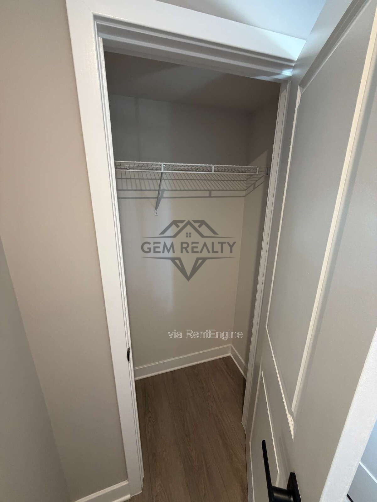 Welcome to Courthouse Commons Townhomes, where you can Rent a brand-new 3 BR 2.5 BA end unit townhome with a one-car garage and a spacious, open-concept floor plan designed for modern living. property image