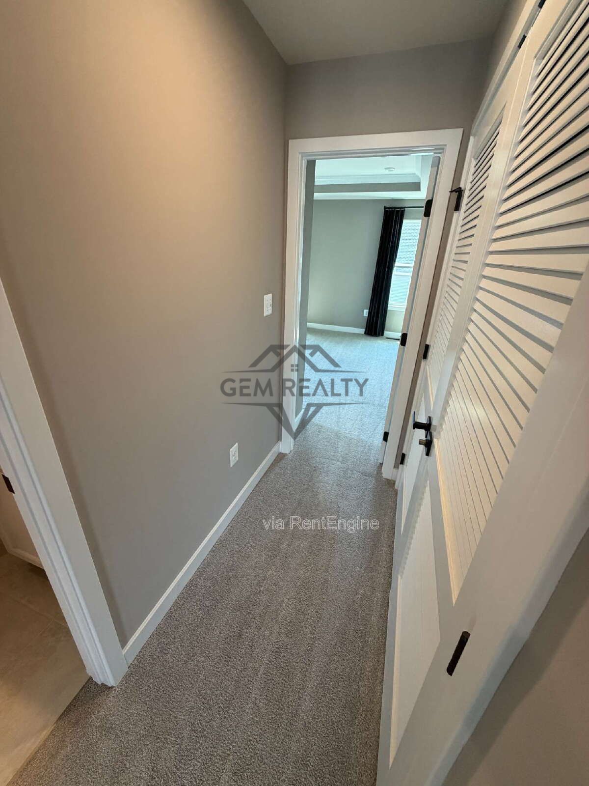 Welcome to Courthouse Commons Townhomes, where you can Rent a brand-new 3 BR 2.5 BA end unit townhome with a one-car garage and a spacious, open-concept floor plan designed for modern living. property image