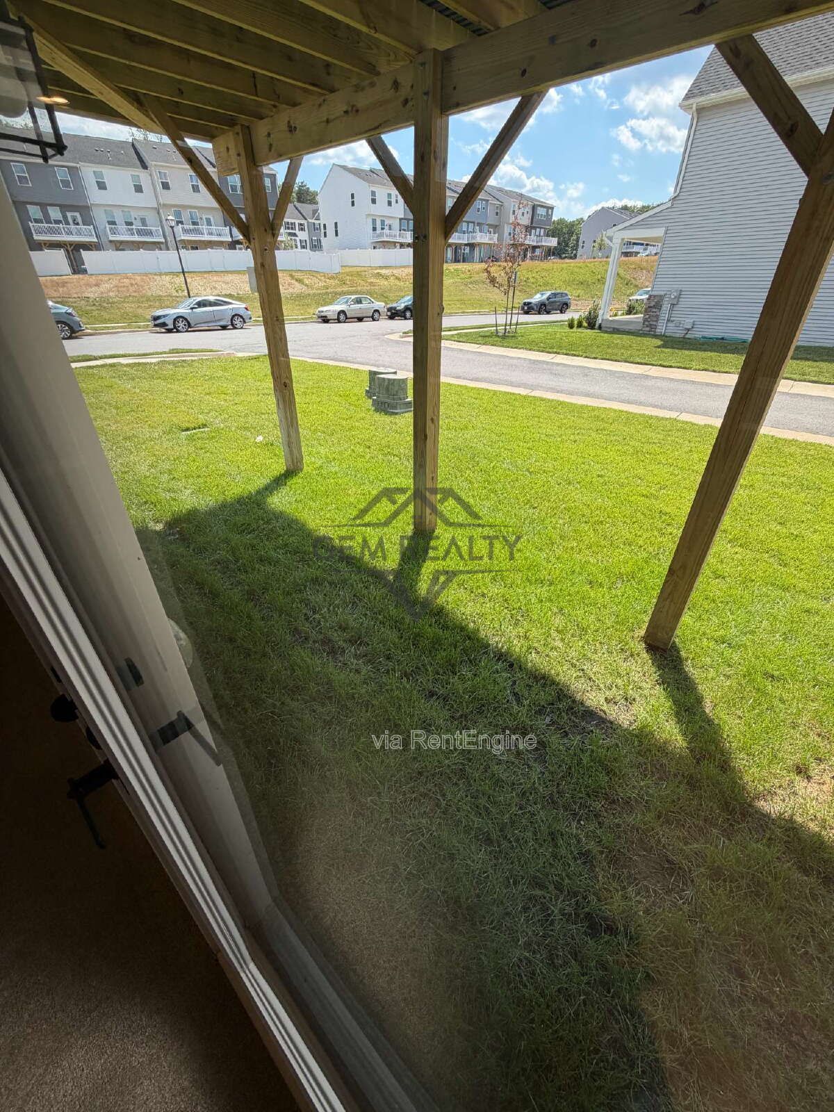 Welcome to Courthouse Commons Townhomes, where you can Rent a brand-new 3 BR 2.5 BA end unit townhome with a one-car garage and a spacious, open-concept floor plan designed for modern living. property image