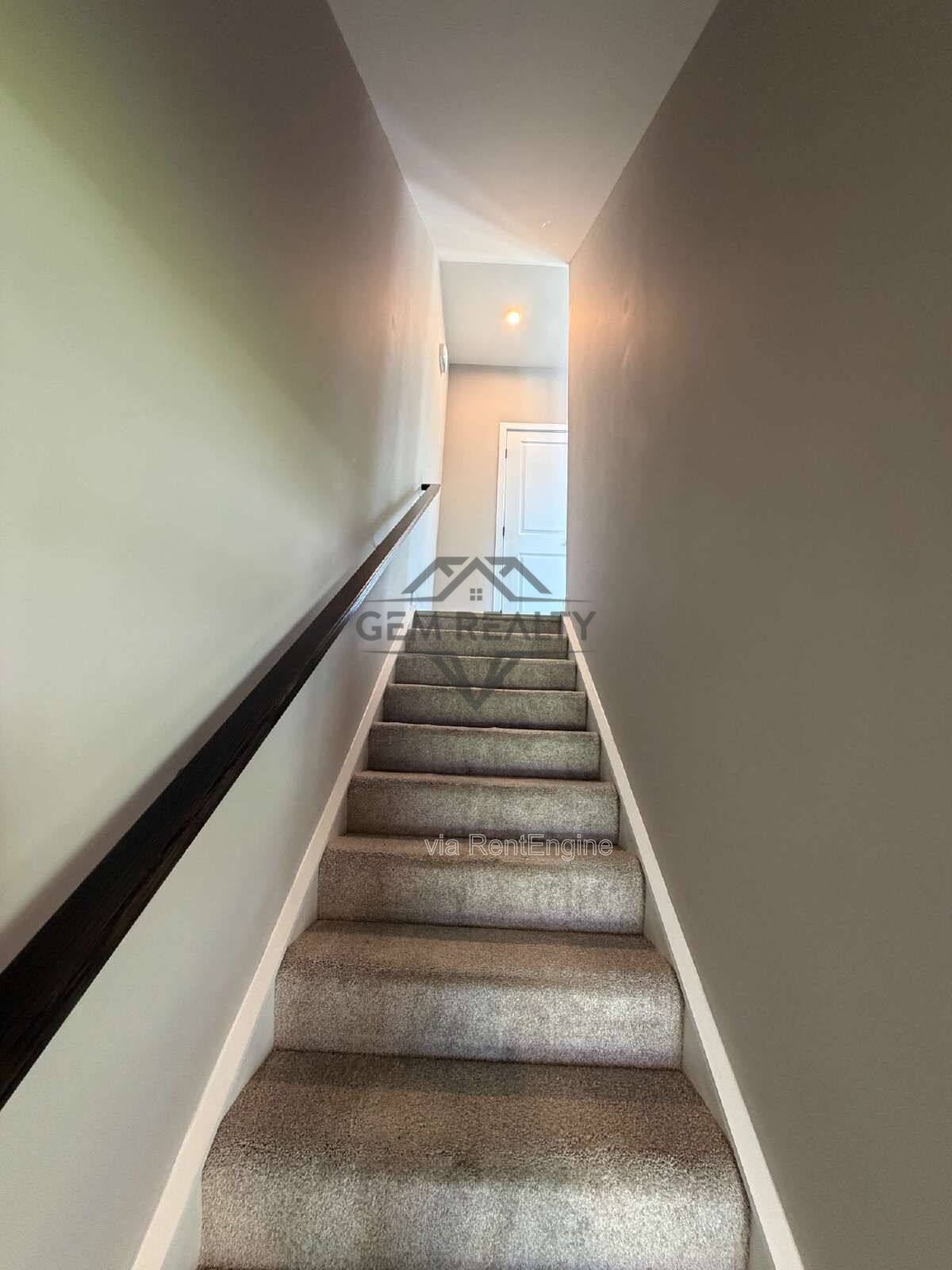 Welcome to Courthouse Commons Townhomes, where you can Rent a brand-new 3 BR 2.5 BA end unit townhome with a one-car garage and a spacious, open-concept floor plan designed for modern living. property image