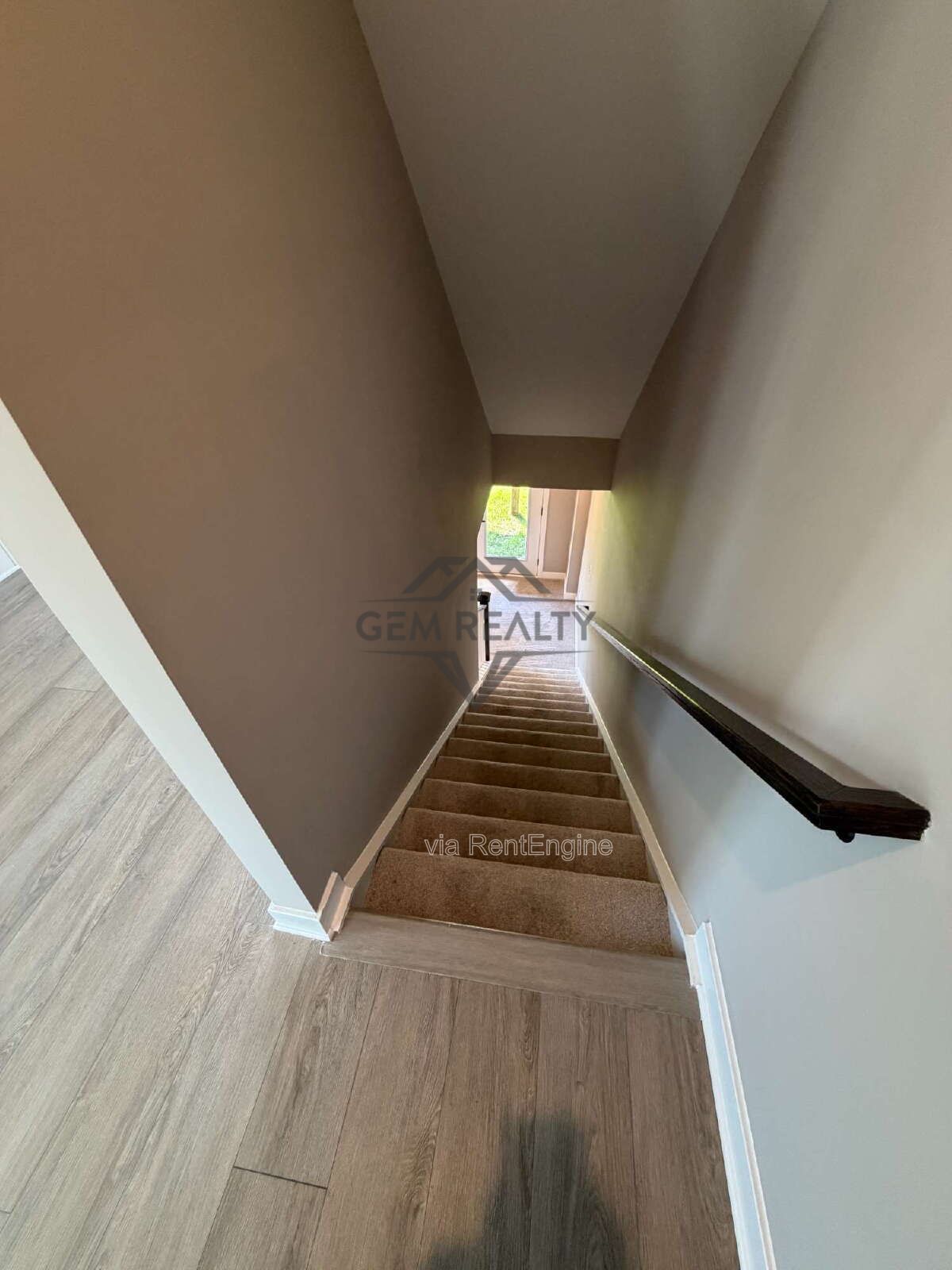 Welcome to Courthouse Commons Townhomes, where you can Rent a brand-new 3 BR 2.5 BA end unit townhome with a one-car garage and a spacious, open-concept floor plan designed for modern living. property image