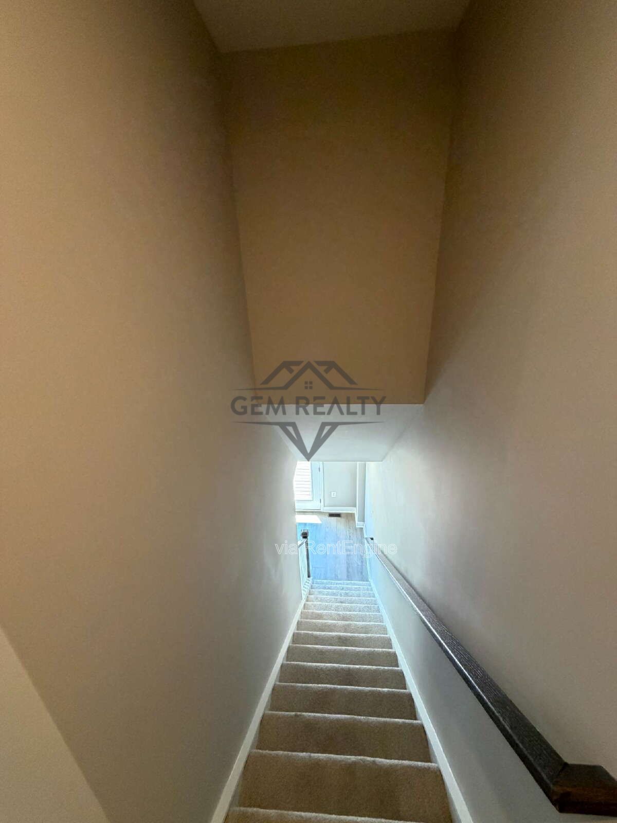 Welcome to Courthouse Commons Townhomes, where you can Rent a brand-new 3 BR 2.5 BA end unit townhome with a one-car garage and a spacious, open-concept floor plan designed for modern living. property image
