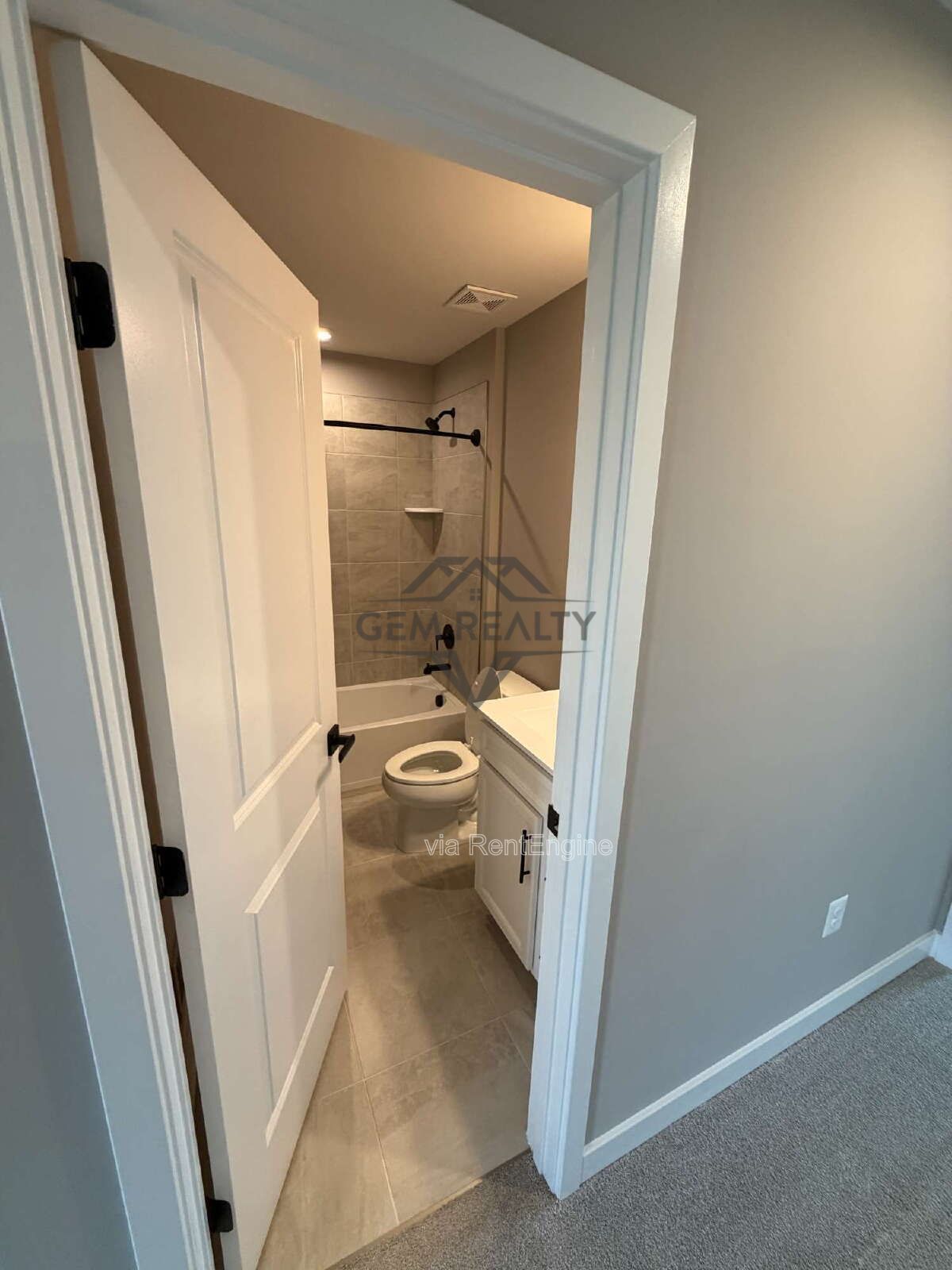 Welcome to Courthouse Commons Townhomes, where you can Rent a brand-new 3 BR 2.5 BA end unit townhome with a one-car garage and a spacious, open-concept floor plan designed for modern living. property image