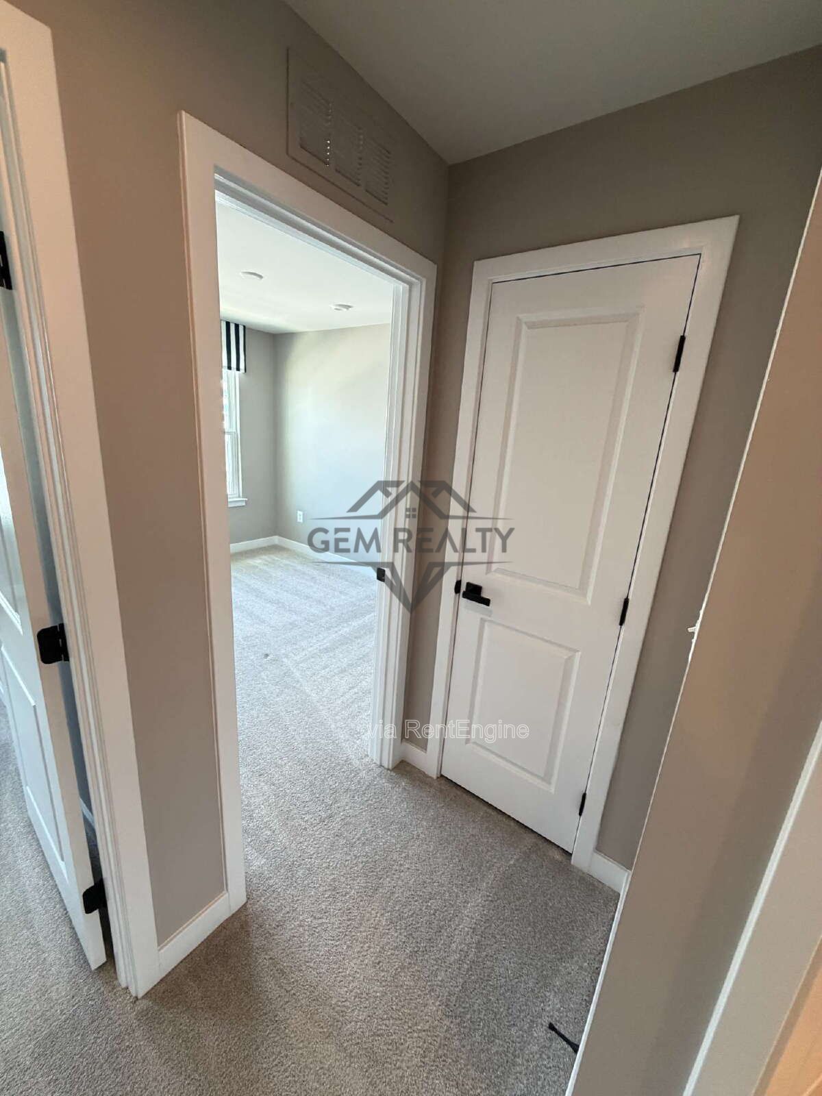 Welcome to Courthouse Commons Townhomes, where you can Rent a brand-new 3 BR 2.5 BA end unit townhome with a one-car garage and a spacious, open-concept floor plan designed for modern living. property image