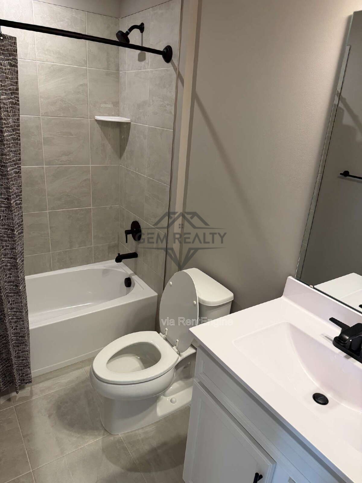 Welcome to Courthouse Commons Townhomes, where you can Rent a brand-new 3 BR 2.5 BA end unit townhome with a one-car garage and a spacious, open-concept floor plan designed for modern living. property image