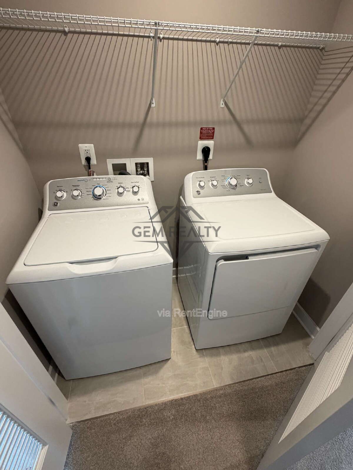 Welcome to Courthouse Commons Townhomes, where you can Rent a brand-new 3 BR 2.5 BA end unit townhome with a one-car garage and a spacious, open-concept floor plan designed for modern living. property image