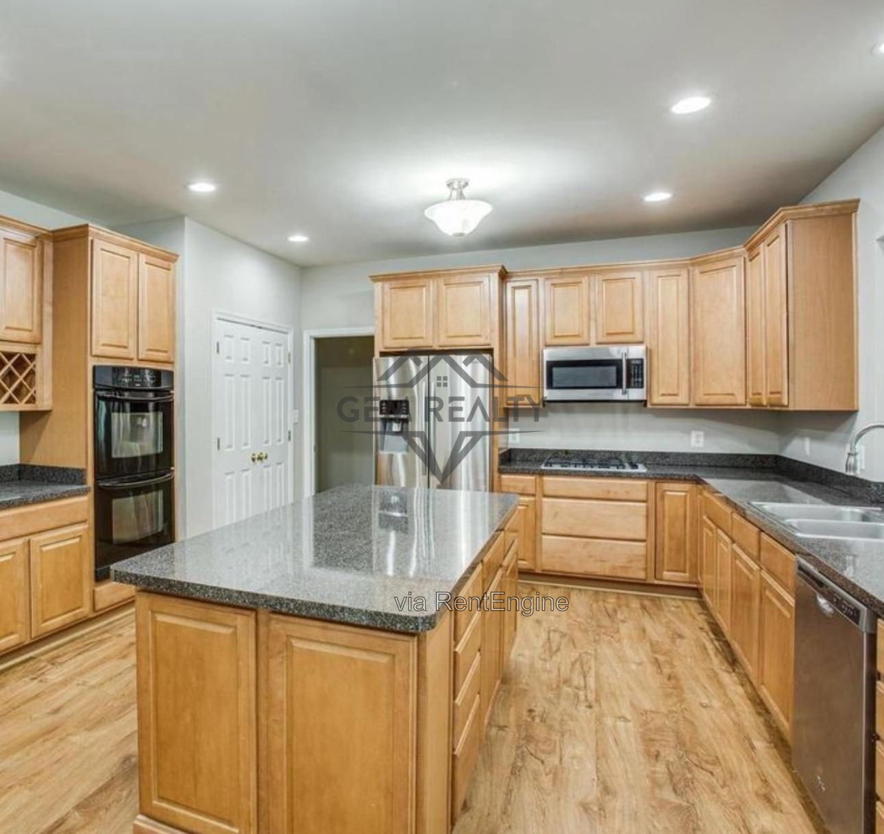 Luxurious, two level. 5-Bed Oasis with 4.5 Baths & Expansive 3,745 Sq Ft at 10410 Silver Creek Court! property image